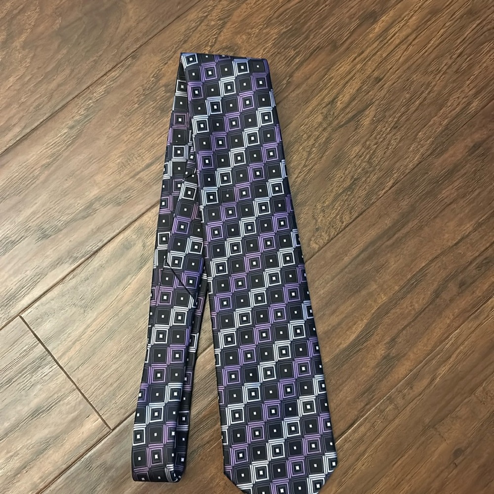 Purple and black square tie
Covington